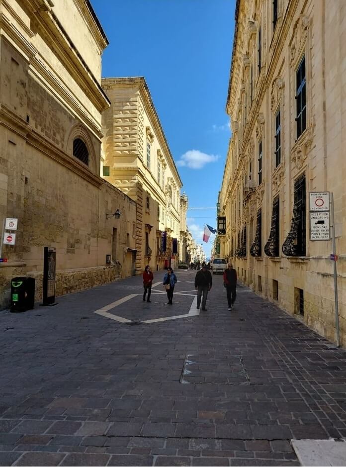 Valletta streets with honey-coloured stone buildings in Malta