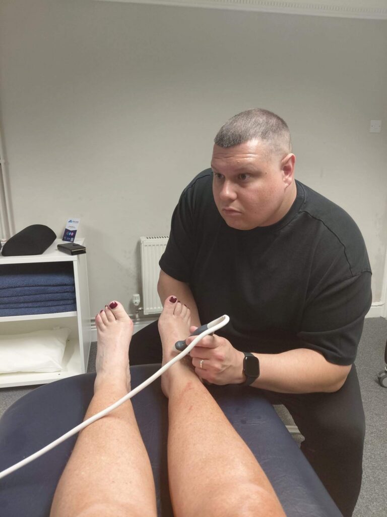 Jay Moore, Physio helping Caroline with recovery