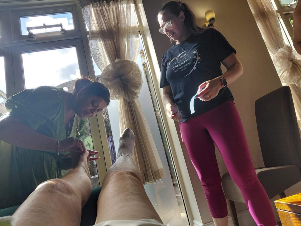 Caroline having plasters changed during walk