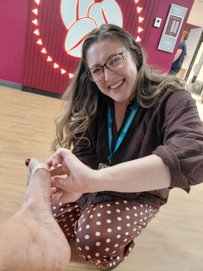 SWFT NHS ladies helping Caro with her plasters
